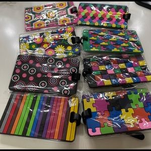 Set of 8 cute colorful luggage tags.